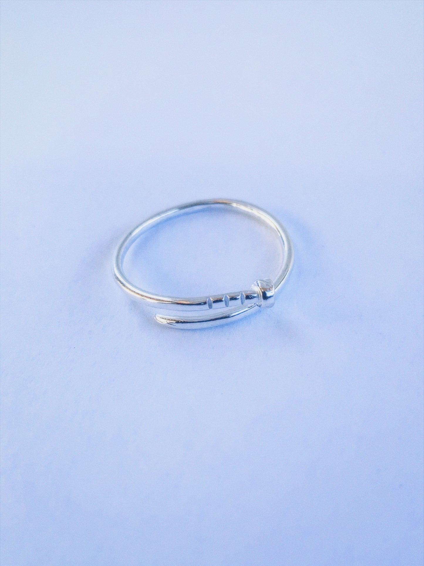 TWISTED NAIL RING